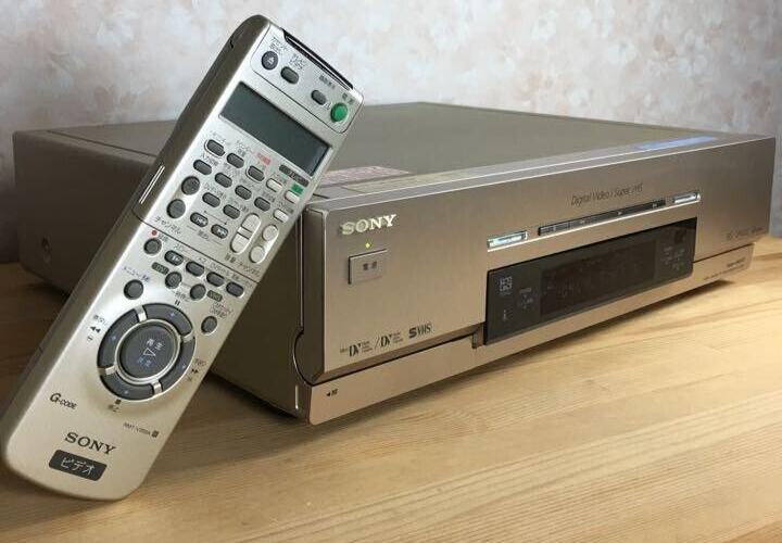 Sony WV-DR7 DV/MiniDV & S-VHS Double VCR Deck w/ Remo-Con Sony WV-DR7 DV/MiniDV & S-VHS Double VCR Deck w/ Remo-Con