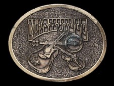 NE13146 VINTAGE 1970s  NASHVILLE  GUITAR, BANJO, FIDDLE MUSIC BELT BUCKLE