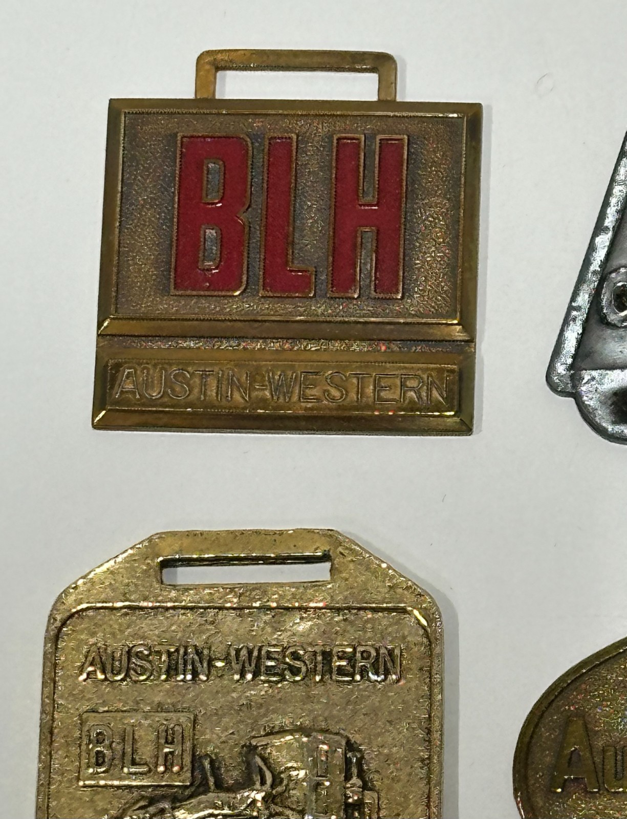 Vtg Austin Western Grader Watch Fob Construction Equipment Advertising lot of 4