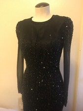 Elegant Beaded Long Sleeves Gown