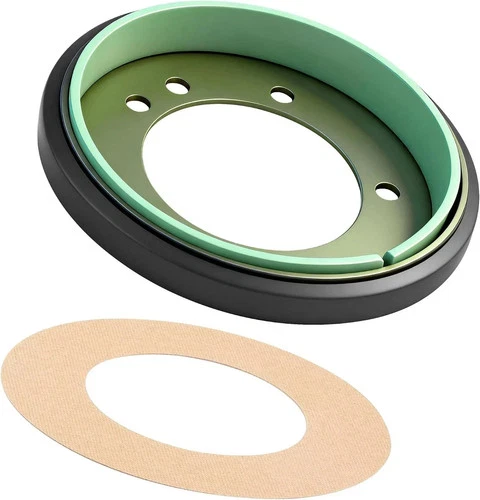 Black and green drive disc with silver center and matching curved liner, shown on white background with visible text.
