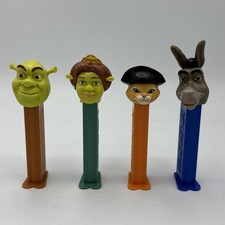 Retired Pez dispensers set of 4. Shrek, Ogress Fiona, Puss 'n Boots, Donkey