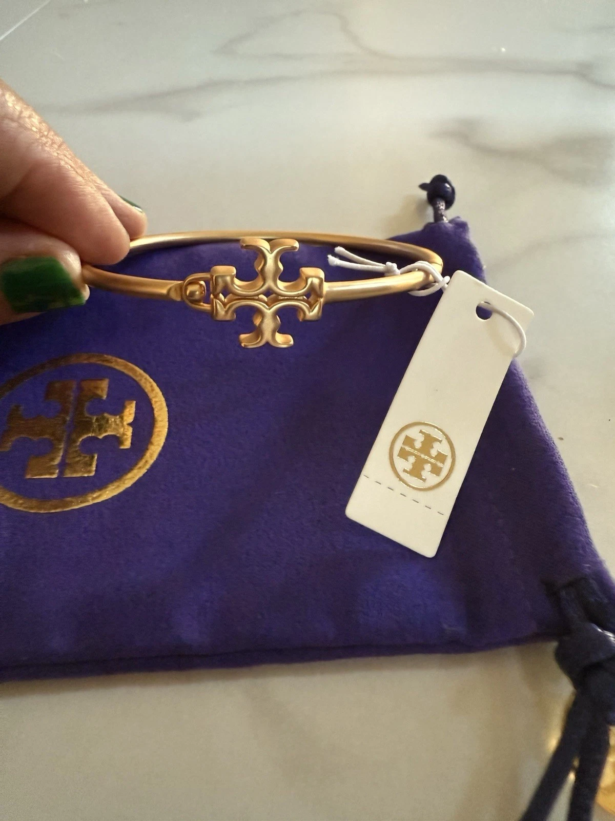 Nuovo bracciale Tory Burch Britten logo oro rosa OS