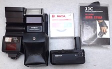 2 lampy błyskowe, Minolta + Carena, a także liczne akcesoria, filtry itp.