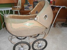 Victorian Wicker baby Carriage made by THAYER with hand brake.