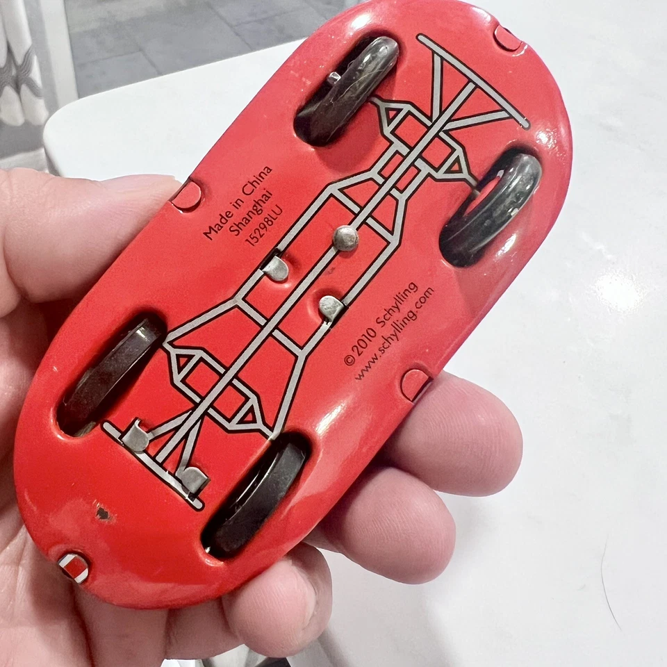 Coche de juguete de hojalata motor fricción corredor cohete rojo Schylling de colección Foto 4 de 4
