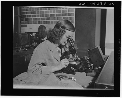 Photo:1940s Woman at Microscope Laboratory Research Photo