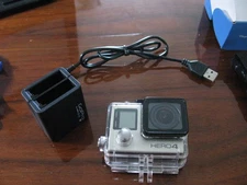 GoPro HERO4 Action Camera - Silver w/head strap/battery charger and HDMI cable