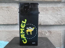 VINTAGE SCRIPTO CAMEL POWERED DISPOSABLE CIGARETTE LIGHTER. SPARKS, NOT LIGHTING