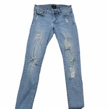 Bebe Skinny Jeans Womens 27 Light Wash Blue Distressed Ripped Denim Mid Rise