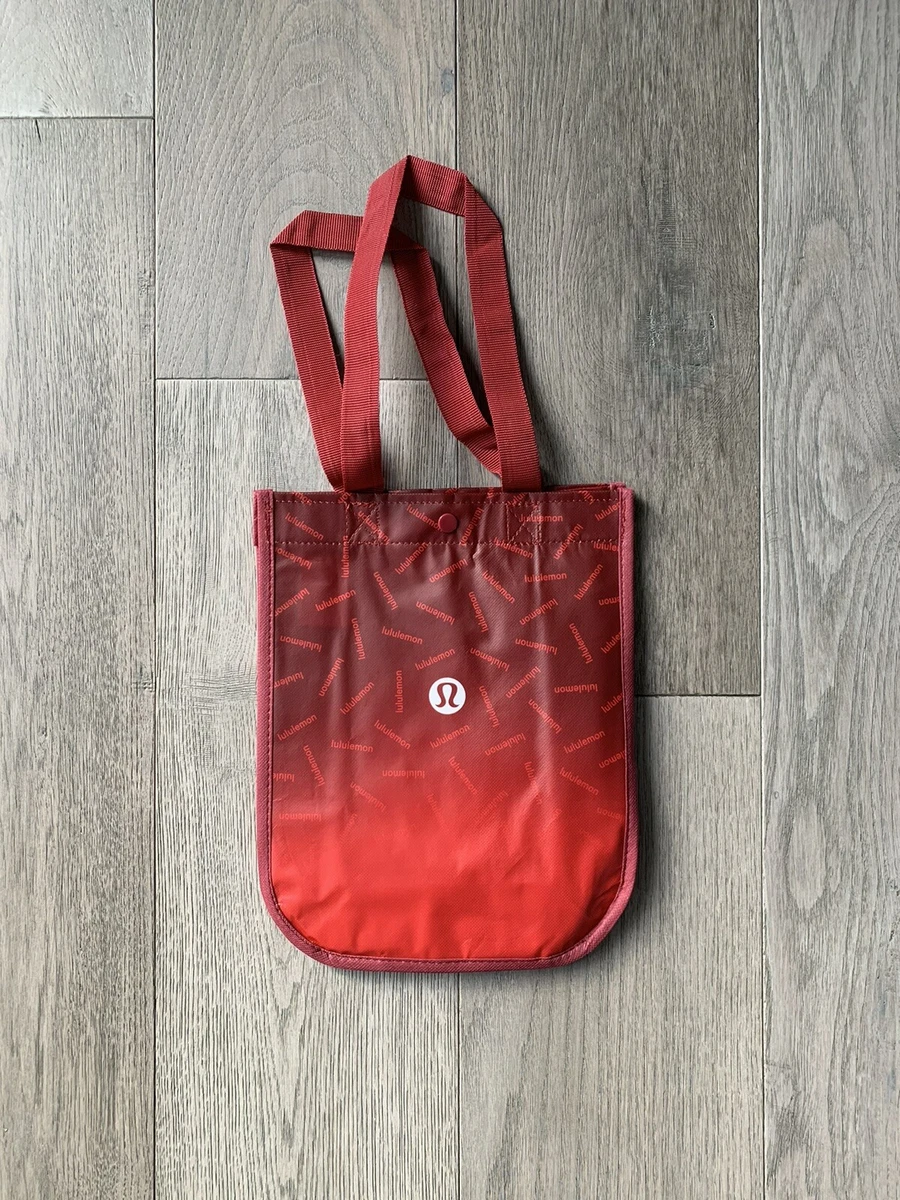 Lululemon reusable small red holiday shopping tote bag