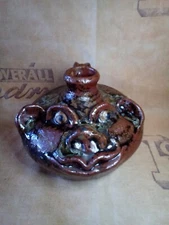  Beautiful Vintage Marie Rogers Buggy Jug -4 inches tall with a brown glaze.