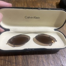 VTG Calvin Klein 146c Bronze Metal Oval Clip-on Sunglasses W Clam Shell Case