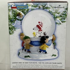 Hallmark Peanuts Snoopy Snow Water Globe Linus & Lucy Woodstock Skating Musical