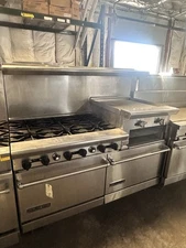 American range 6 Burner , Griddle , and two Ovens Natural Gas