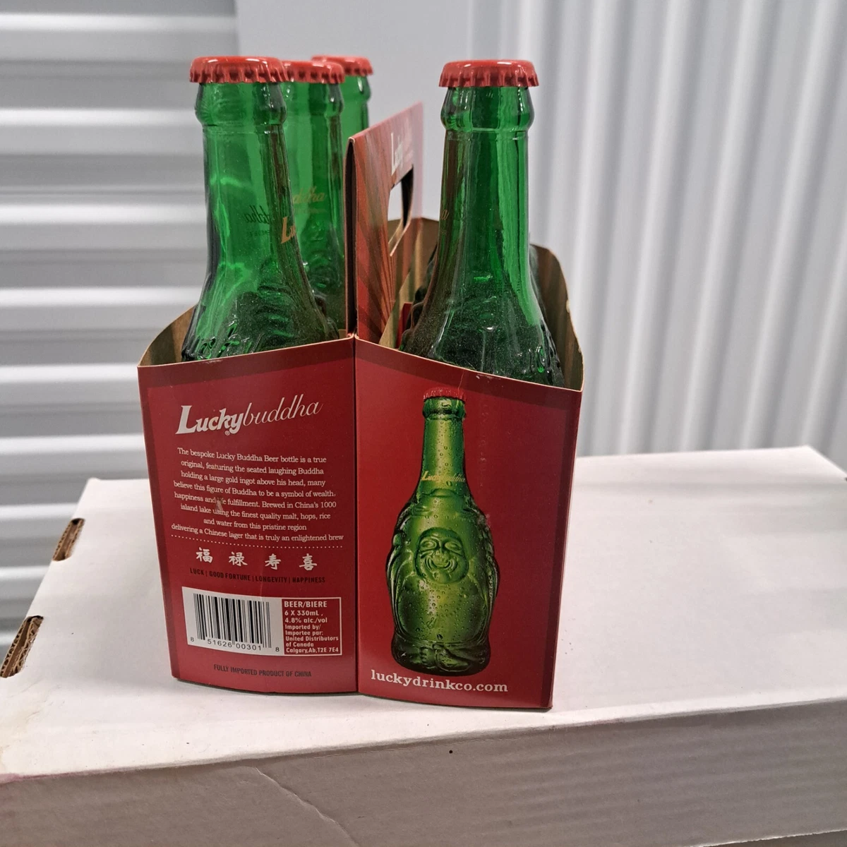 Budda beer bottles $20-  6 pack w/ carrying case and undamaged caps attached.