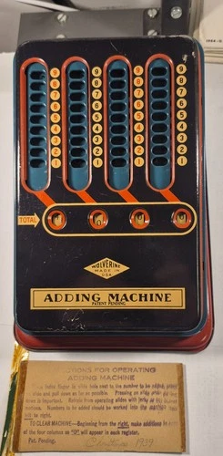Vintage 1940's mechanical Wolverine Tin Toy Adding Machine Pull Dial Calculator