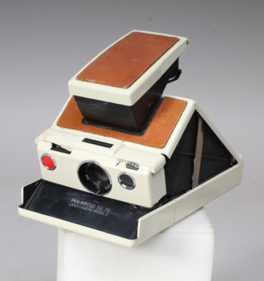 POLAROID SX-70 MODEL 2 FOR PARTS OR REPAIR WON'T POWER UP POLAROID SX-70 MODEL 2 FOR PARTS OR REPAIR WON'T POWER UP