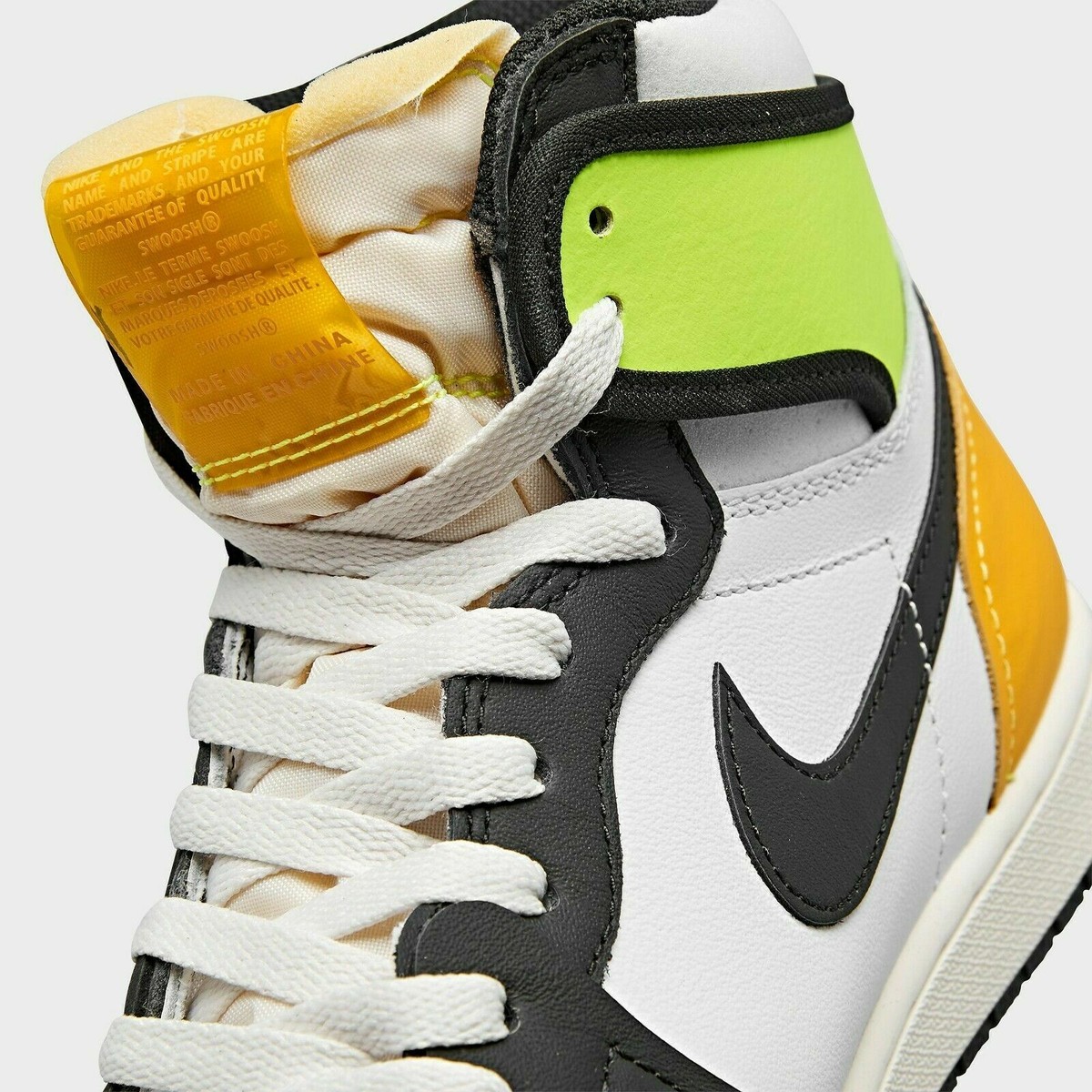 Jordan 1 Retro High OG White Black Volt University Gold 