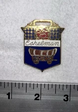 Vintage Watch Fob Eshelman with Rose & Covered Wagon Enamel Advertising