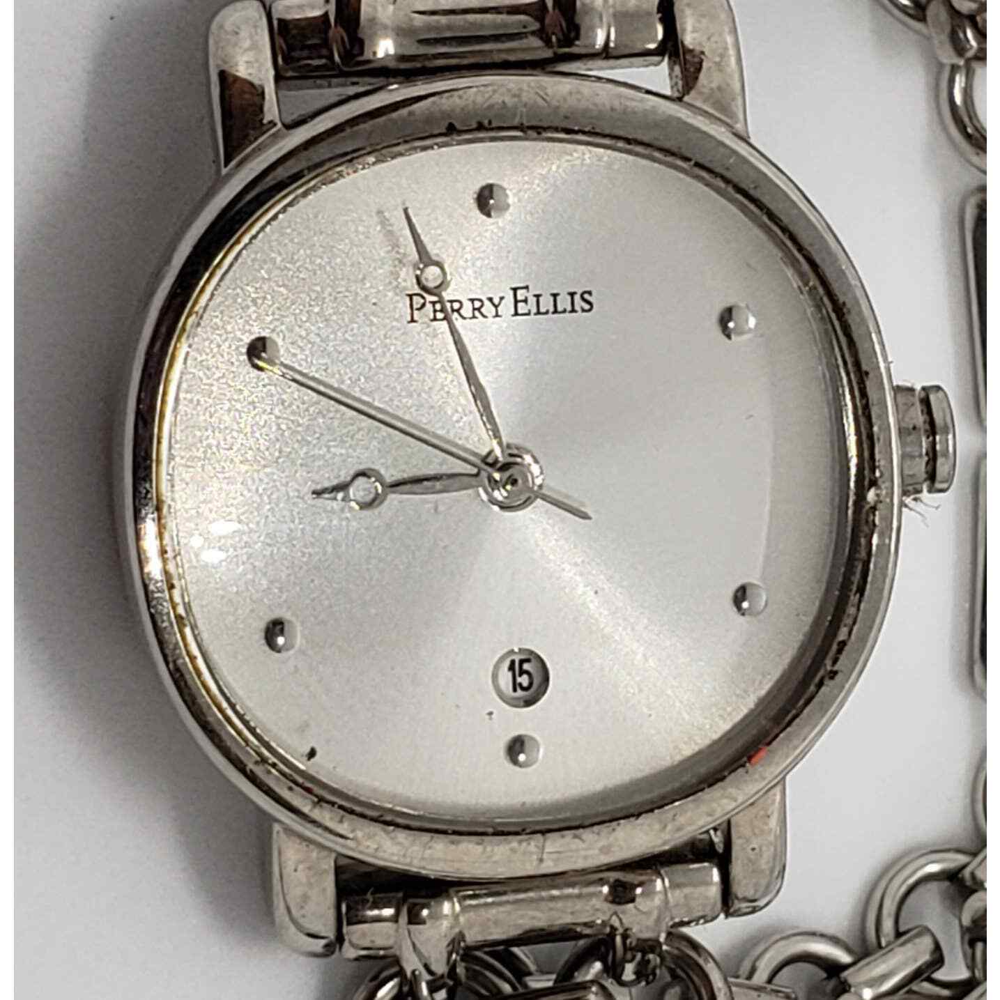 Perry Ellis women's watch. PEL0007. White iridescent face. Calendar date on face