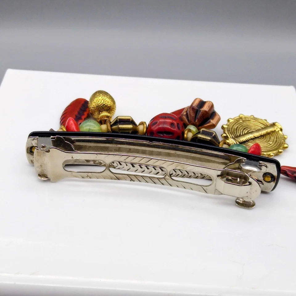 Clip de pelo retro tribal colgante, pasador de plástico vintage Foto 3 de 3