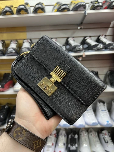 Sac en cuir Christian Dior noir Dioraddict pochette bracelet