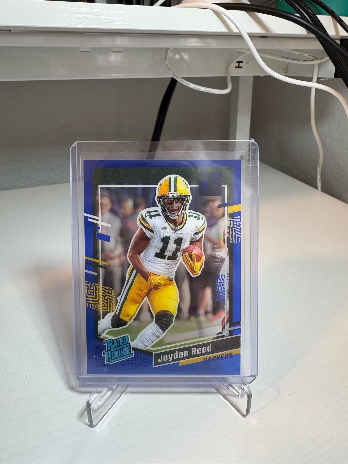 2023 Panini Clearly Donruss - Rated Rookie Jayden Reed #68 Blue /99 (RC)