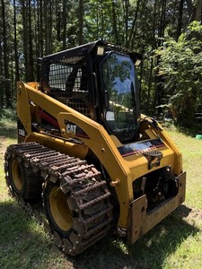 2005 Cat 236b Skid Steer with lots of attachments!