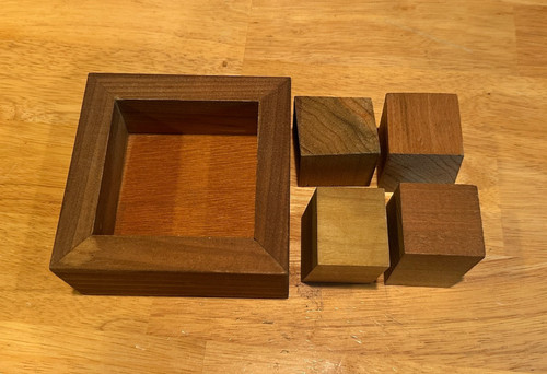 Block Head Bill Cuttler wood packing puzzle