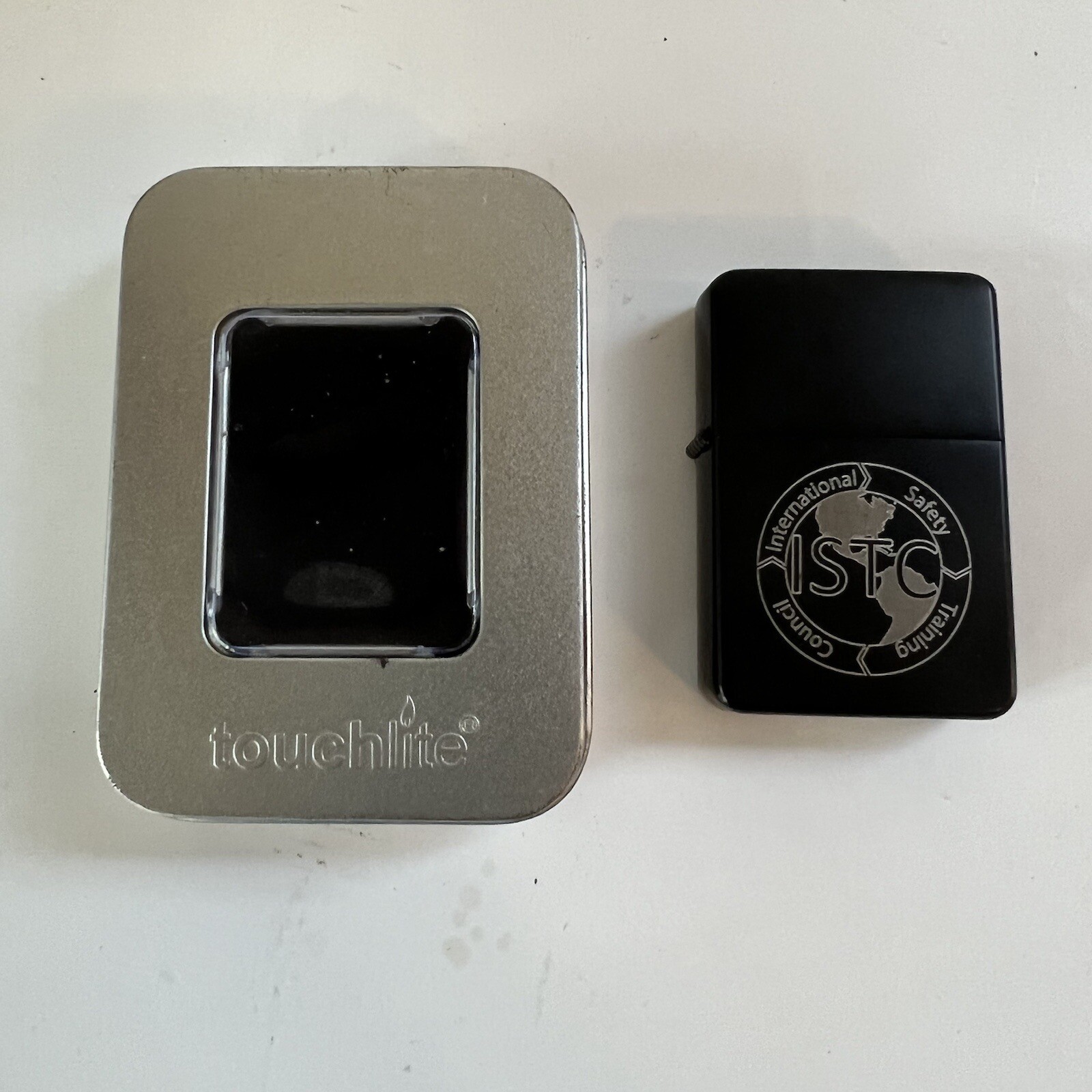 Advertising INTERNATIONAL SAFETY TRAINING COUNCIL Touchlite Cigarette Lighter