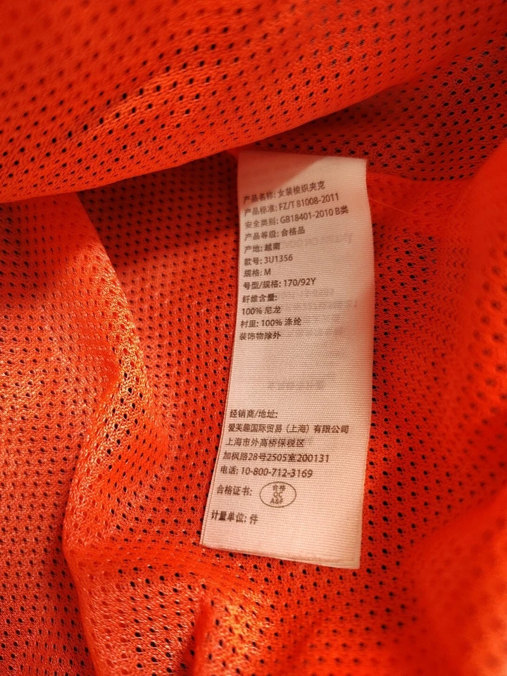 Chaqueta cortavientos Hollister M negra/neón con capucha Foto 3 de 4