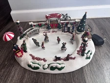 The Village Collection St Nicholas Square Skaters   Works  NOT QUITE PERFECT