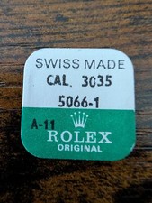 ROLEX-SPRING CLIP -FACTORY SEALED- CALIBER 3035 PART 5066-1 0.150mm