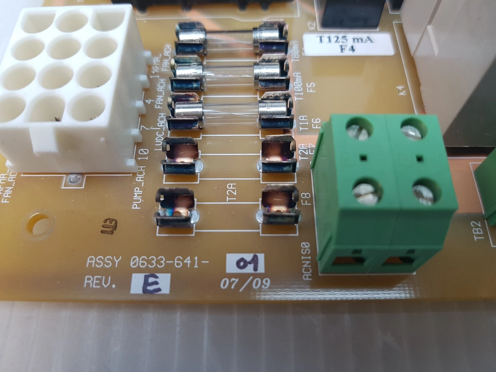 ASSY 0633-641-01 REV E 07/09 marking beside the fuse row and T125 mA F4 label