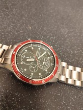 Seiko chronograph red bezel black dail watch