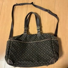 Rare  Louis Vuitton Monogram Mini Run Sac Alang