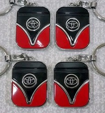 Toyota Keychain metal 4 pieces,unique,.rare.Length 1,2 inc, total height 3,6 inc