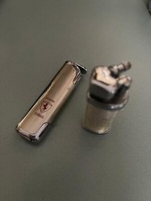 Coppia di accendini Ferrari elettronico e meccanico