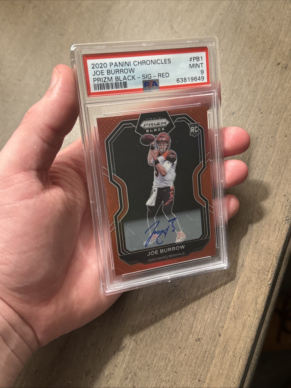 2020 Panini Chronicles Joe Burrow Prizm Black /99 SIG Red