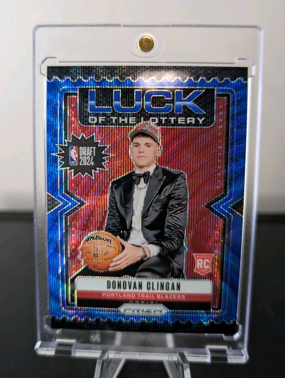 Donovan Clingan 2024-25 Panini Prizm Luck of the Lottery Blue Wave /175 RC #9