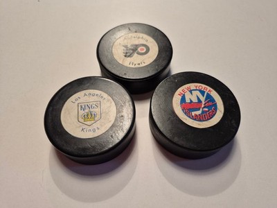 Lot of 3 NHL pucks - 70's (1973 or 1974) - Kings, Islanders, Flyers