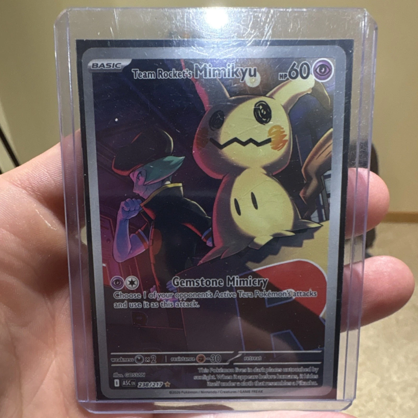 Pokémon Team Rocket's Mimikyu Card 238/217 ASC Regular Basic 2023