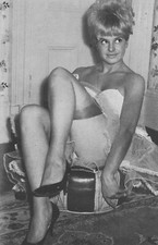 Mature British Lady In Nylons Stockings Frilly Skirt Leggy Pose - Photograph 51