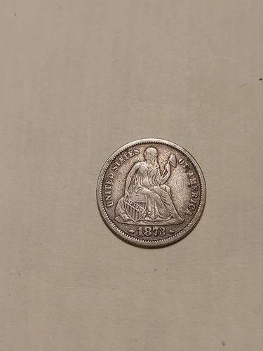 1873 seated liberty dime with arrows , full liberty on shield FINE condition
