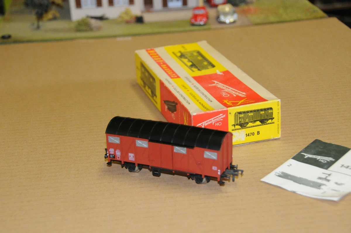 UN WAGON PLAT A ESSIEUX MARRON DB FLEISCHMANN SANS BOITE HO N°1
