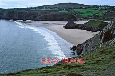 FOTO DREI KLIPPEN BAY GOWER HALBINSEL DREI KLIPPEN BUCHT HAT EINEN SCHÖNEN SAND B
