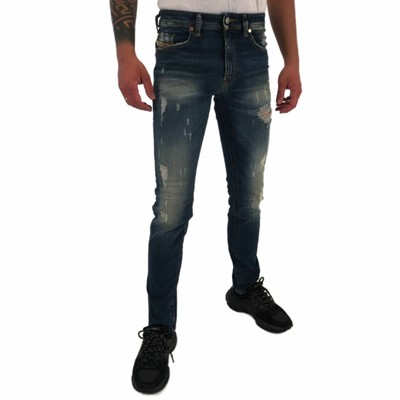 distressed diesel jeans