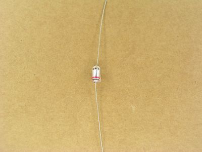 S00958A (5 Pc Lot) 100 pf 125 volt 125V +- 10 % axial polystyrene capacitor