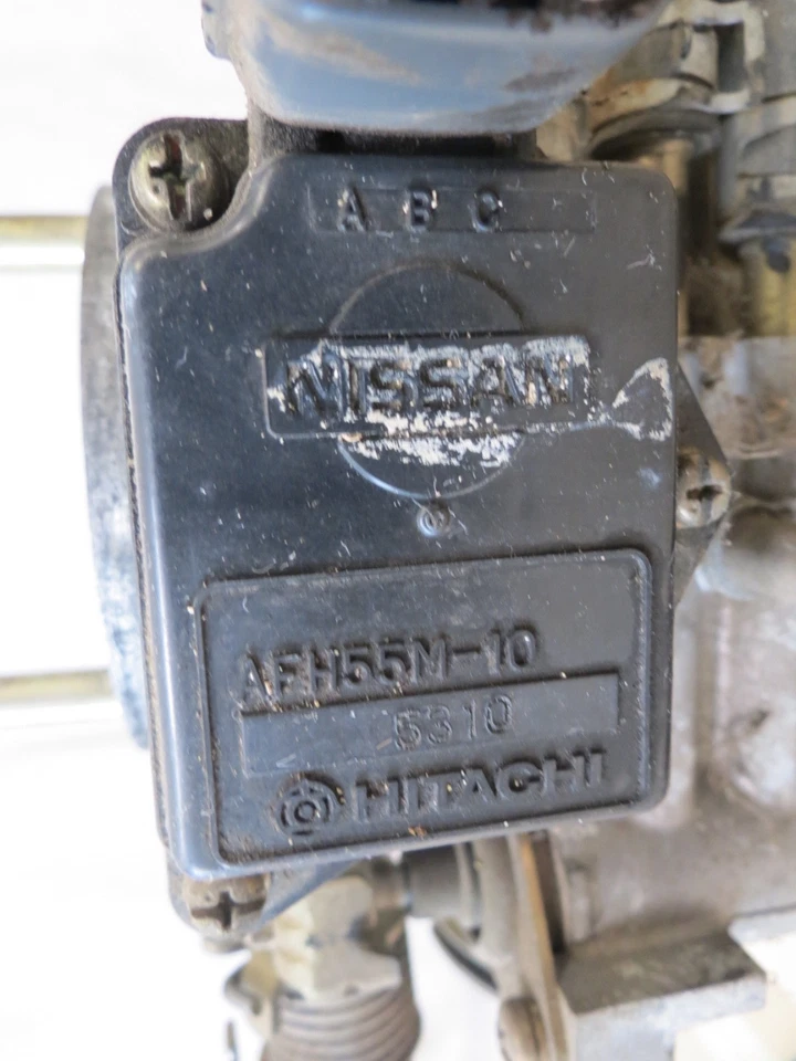 90 91 92 93 94 Nissan D21 camión de carrocería dura 2,4 L válvula de carrocería del acelerador de combustible AFH55M-10 Foto 3 de 4